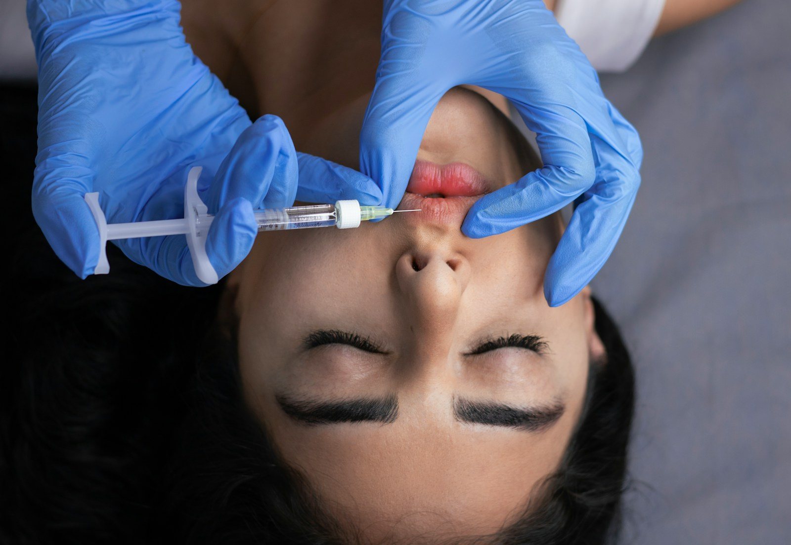 A patient receiving an injectable treatment